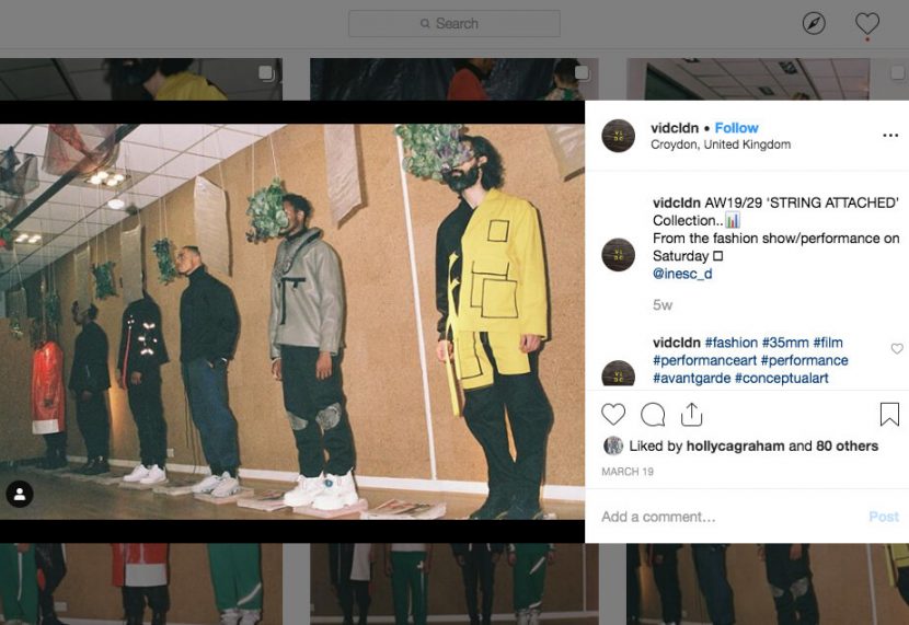 An image of instagram with a range of people standing at the wall with a green thing hanging in front of them