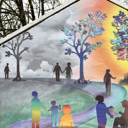 a close up of one of the fungus boards. an image of silhouettes walking in a park can be seen