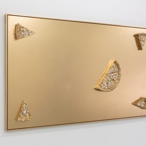 A metallic slab with slices of metallic pizza over it
