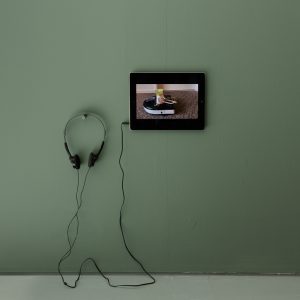 headphones connected to a small screen