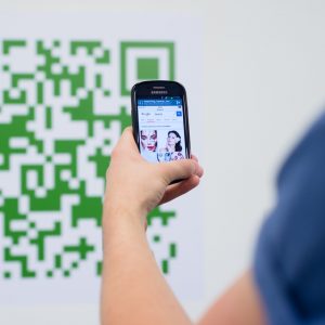 Someone who scanned the large green qr code painted on the wall